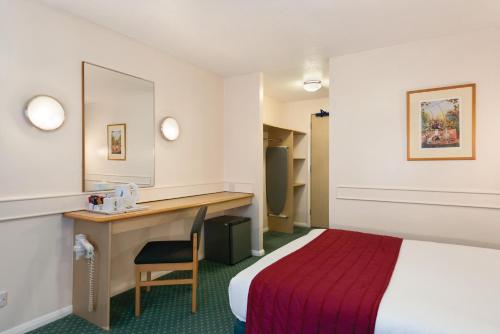 Ένα ή περισσότερα κρεβάτια σε δωμάτιο στο Days Inn Hotel Sheffield South