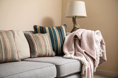 Et opholdsområde på Ground Wing - Norfolk Cottage Agency