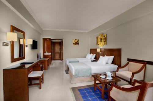Postel nebo postele na pokoji v ubytování Sultan Gardens Resort Sharm El Sheikh - Ultra All Inclusive