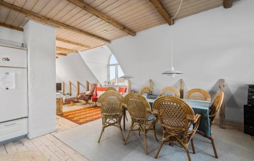 a dining room with a table and chairs at 2 Bedroom Nice Apartment In Ribe in Ribe