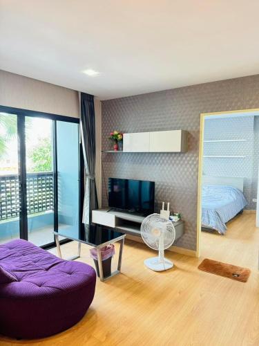Ένα ή περισσότερα κρεβάτια σε δωμάτιο στο Minnie room Pattaya 3