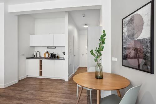 Kuchyň nebo kuchyňský kout v ubytování Limehome Leipzig Am Brühl