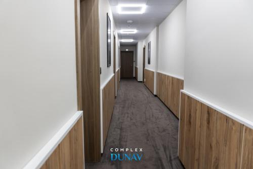 a corridor of a hospital hallway with wooden halls at Комплекс Дунав in Ruse