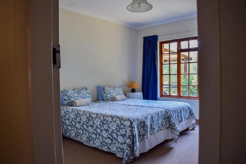 Postel nebo postele na pokoji v ubytování Crane Cottage