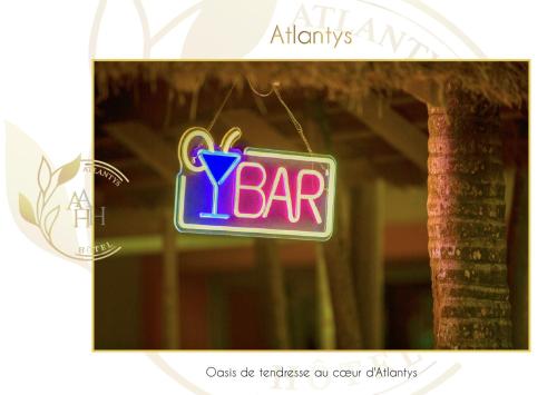 a sign that says bar hanging in a window at Hotel l'ATLANTYS in Yopougon-Attié