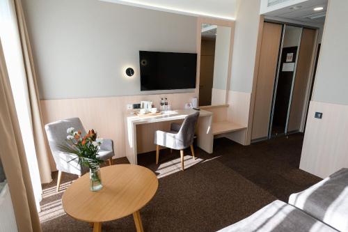 Nota Bene Hotel & Restaurantにあるテレビまたはエンターテインメントセンター