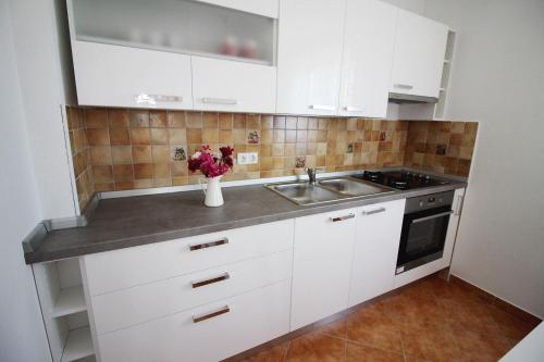 Charmantes Ferienhaus mit Meerblick, 2 Fahrraeder, Grill, privater Balkon, Waschmaschine