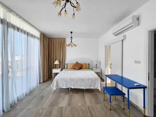 Katil atau katil-katil dalam bilik di Relaxing Holiday Villa