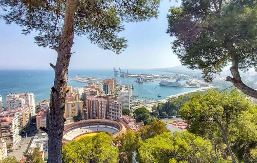a view of a city with boats in the water at Gorgeous Home In Malaga in Málaga