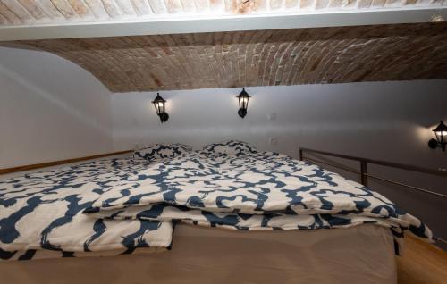 Postel nebo postele na pokoji v ubytování Zenroom Apartments
