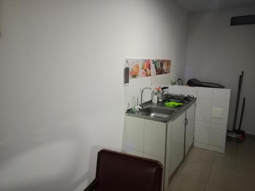 Kuchyň nebo kuchyňský kout v ubytování Apartaestudio Norte de Neiva