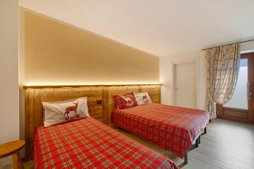 Ένα ή περισσότερα κρεβάτια σε δωμάτιο στο Agriturismo La Grange