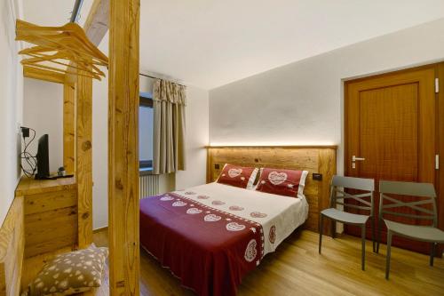 Ένα ή περισσότερα κρεβάτια σε δωμάτιο στο Agriturismo La Grange