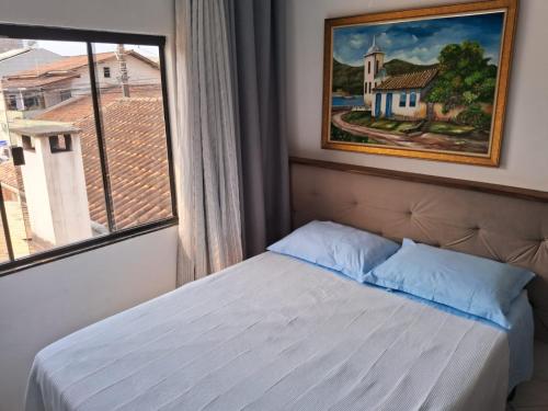 Postel nebo postele na pokoji v ubytování Quarto 03 vó Vera