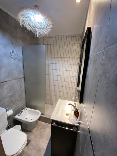 Et badeværelse på Departamento Boutique del mar