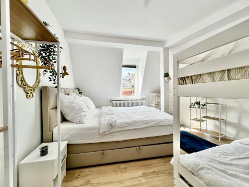 Katil atau katil-katil dalam bilik di Sunny Stay Apartments Coburg zentral mit Parkplatz