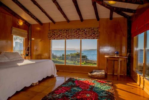 Ένα ή περισσότερα κρεβάτια σε δωμάτιο στο Orilla al Mar-Casona y 3 unidades para hasta 20 personas