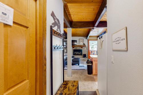 a hallway of a house with a living room at Breckenridge Bliss Retreat in Breckenridge