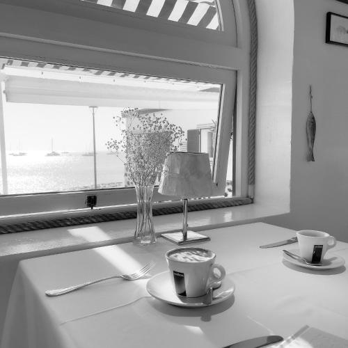 Příslušenství pro přípravu čaje a kávy v ubytování AVANTI Lifestyle Hotel - Only Adults