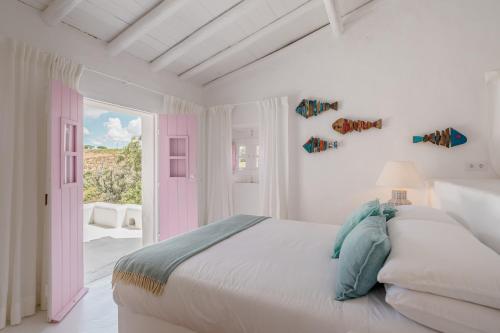 En eller flere senge i et værelse på Casa da Encosta