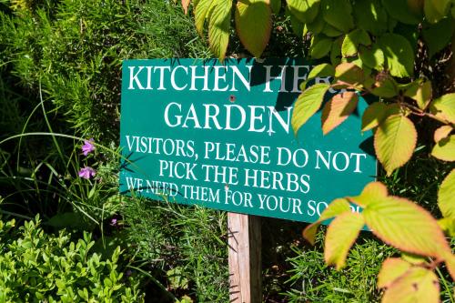 a sign that says children be garden victims please do not pick the herbs istg istg at Ballyknocken Milking Parlour Self Catering Apartment in Coolnakilly