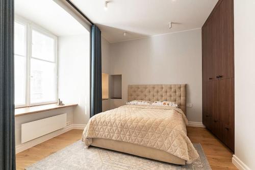 Ένα ή περισσότερα κρεβάτια σε δωμάτιο στο Dictumfactum Love Nest on Pikk