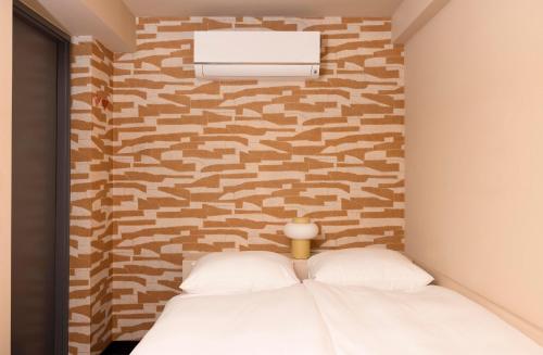 Ένα ή περισσότερα κρεβάτια σε δωμάτιο στο THE FRITZ Hotel Amsterdam