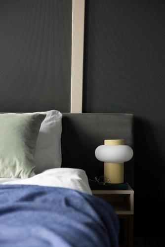 Ένα ή περισσότερα κρεβάτια σε δωμάτιο στο THE FRITZ Hotel Amsterdam