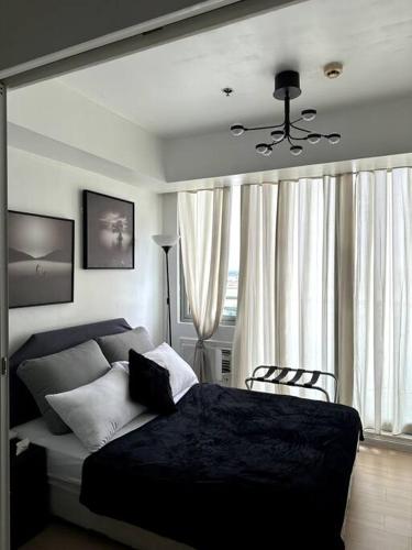 El Spacio Azure 1BR with PS4 & Netflix