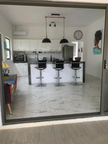 Η κουζίνα ή μικρή κουζίνα στο Charmante villa 2 chambres à 5 min de la plage