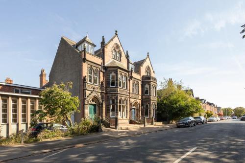 an old building on the side of a street at Host & Stay - Chatsworth Townhouse II in Carlisle
