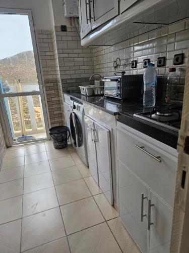 Η κουζίνα ή μικρή κουζίνα στο Appartement M'diq