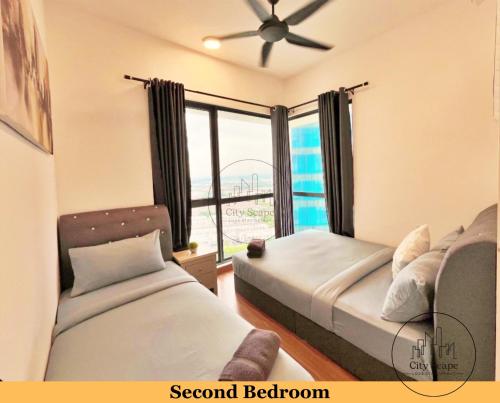 a bedroom with two beds and a large window at Setia Alam Sunsuria Forum Soho Suites by Cityscape in Setia Alam