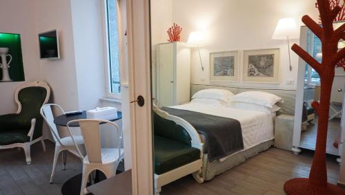 A bed or beds in a room at Ca' de Tobia