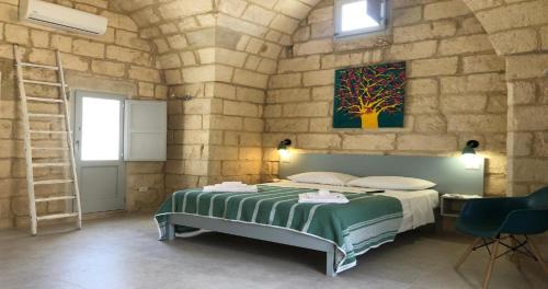 Galería fotográfica de Odegos Monolocali Vico Sant'Antonio en Carpignano Salentino