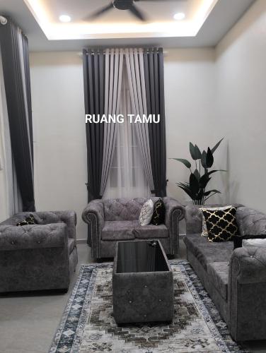 Χώρος καθιστικού στο D'Raudhah Homestay