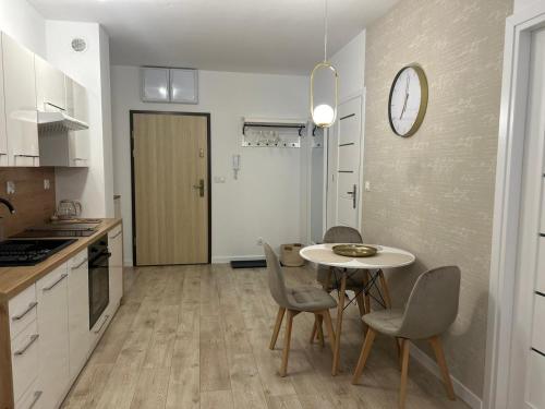 Η κουζίνα ή μικρή κουζίνα στο Apartament Skarbowa Star