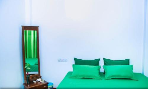 Ένα ή περισσότερα κρεβάτια σε δωμάτιο στο Dhanashi Villa Talalla