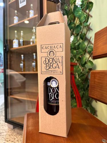 a cardboard box sitting on top of a table at Hotel Netto in Cachoeiras de Macacu