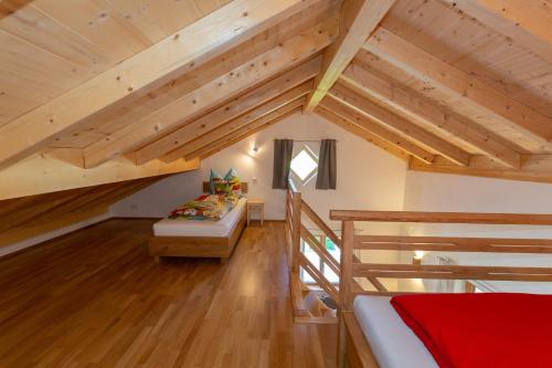 En eller flere senge i et værelse på Kurzenwirt - Ferienwohnungen