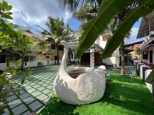 Taman di luar Happy homes - Thundathil