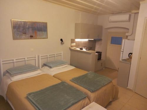 Postel nebo postele na pokoji v ubytování Studio CASINELLA