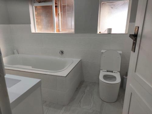 Ένα μπάνιο στο Maglovir 5 ROOMS BULK