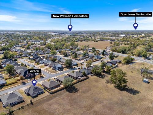an aerial view of a village with houses and a street at Beautiful 3 bed 2 bath home near Crystal Bridges in Bentonville