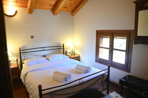 Una cama o camas en una habitación de Villa view Arachova