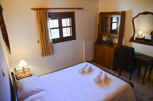 Una cama o camas en una habitación de Villa view Arachova