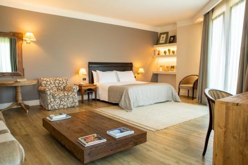 Postel nebo postele na pokoji v ubytování Hotel Touring