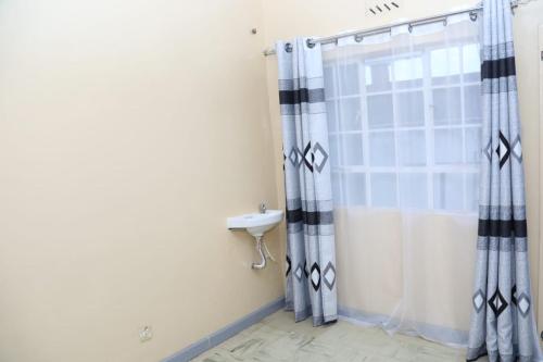 Koupelna v ubytování Dona J homes