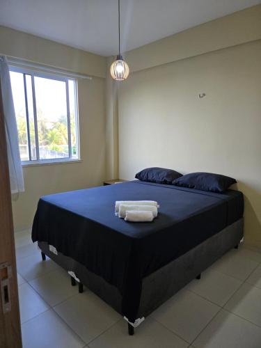 Postel nebo postele na pokoji v ubytování Cumbuco Residence - Beira-mar - Ar condicionado, perto do centro, 2 dormitórios, piscina, cozinha