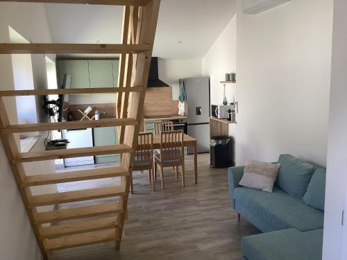 Posezení v ubytování Logement de Tiphanie et Quentin